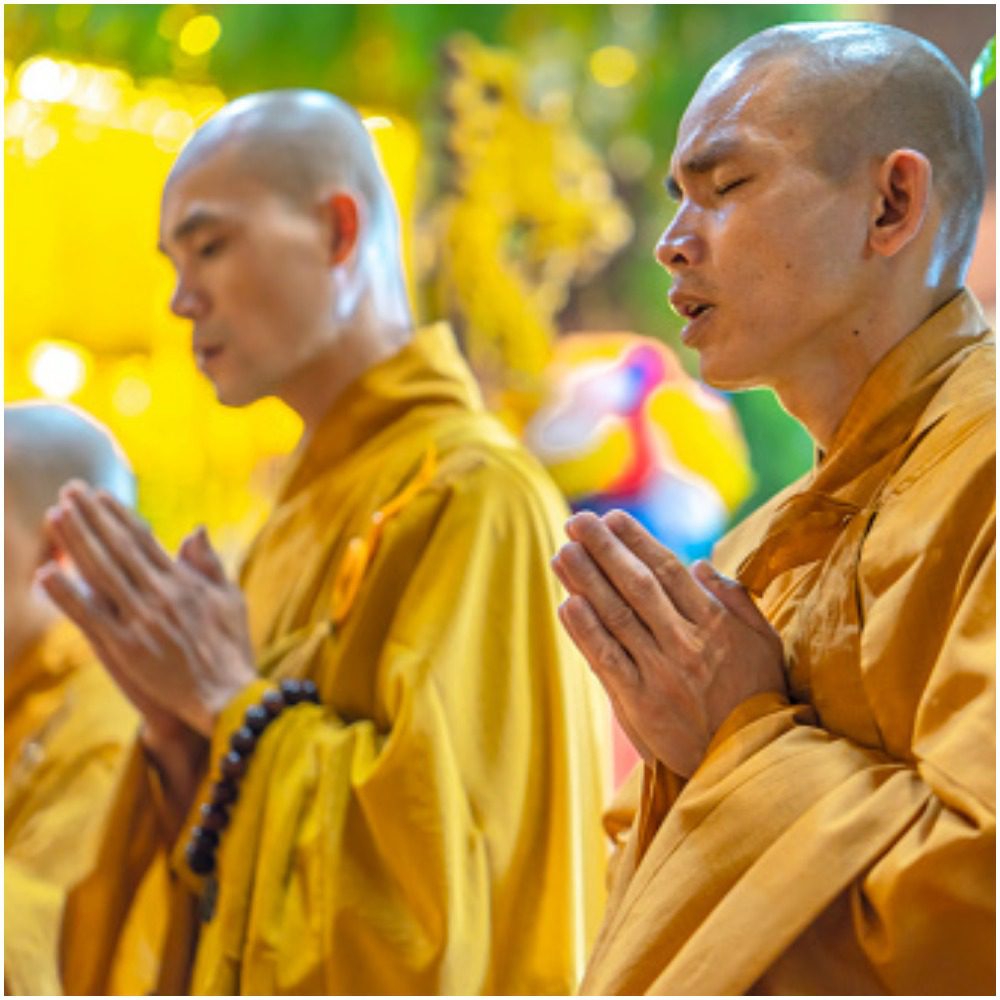 Buddhist men meditating